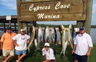 MGFC photo of tuna and dolphin at cypress cove marina.